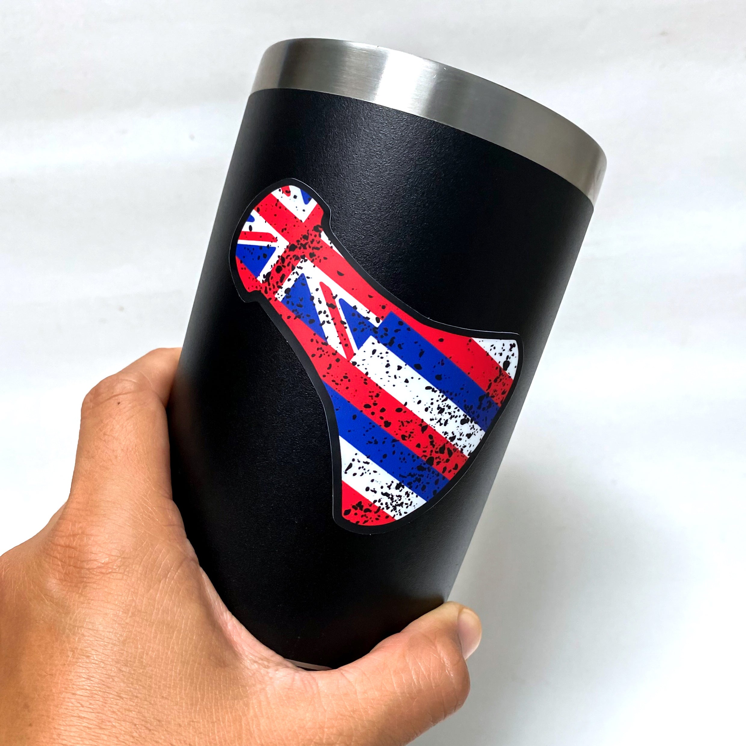 A stylish black tumbler displaying the Hawaiian flag, representing the state's rich culture and heritage