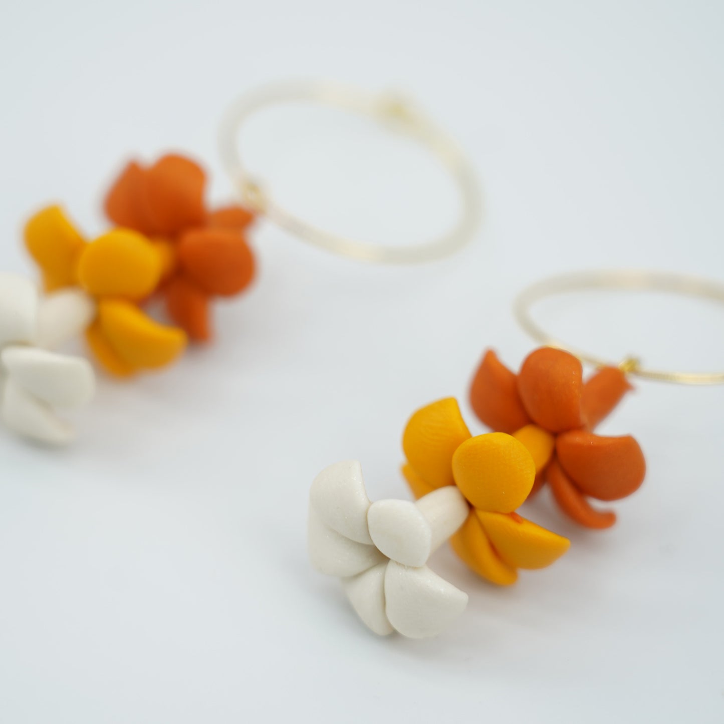 Tricolor Puakenikeni Lei Gold Hoop Earrings