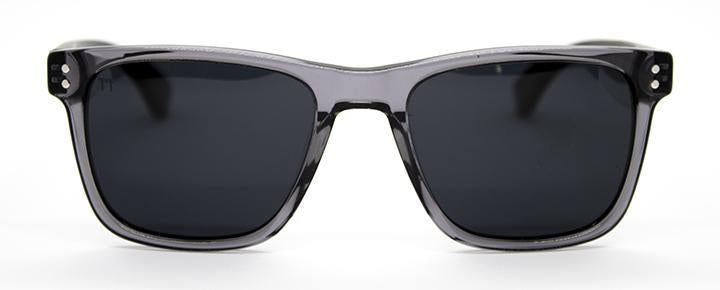 Front-facing view of Templ's signature sunglasses, showcasing premium dark polarized lenses and a smooth, crystal grey frame, crafted for a timeless, confident look.