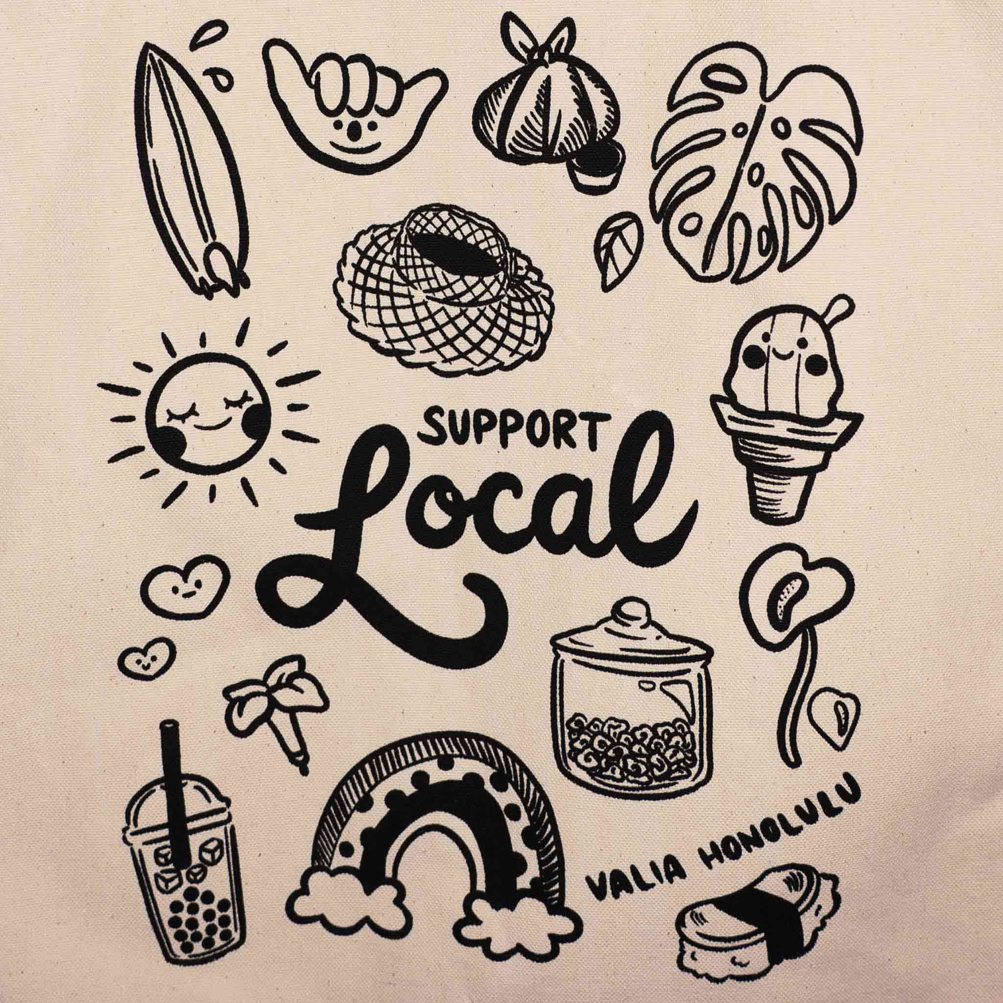 Zoomed-in detail of the tote’s whimsical black illustrations celebrating Hawai‘i culture, with doodles of local treats and tropical favorites surrounding the heartfelt "Support Local" message. The perfect blend of charm and purpose, screen printed on natural canvas for everyday carry with Aloha spirit.