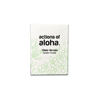 Book titled 'actions of aloha' with green floral designs on a white background