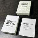 Actions of Aloha cards and box on a dark surface