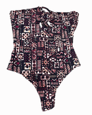 A one-piece swimsuit featuring an all-over Polynesian tribal geometric pattern in burgundy, black, and white. The design includes various island motifs like flowers and repetitive line work, set against a white background.